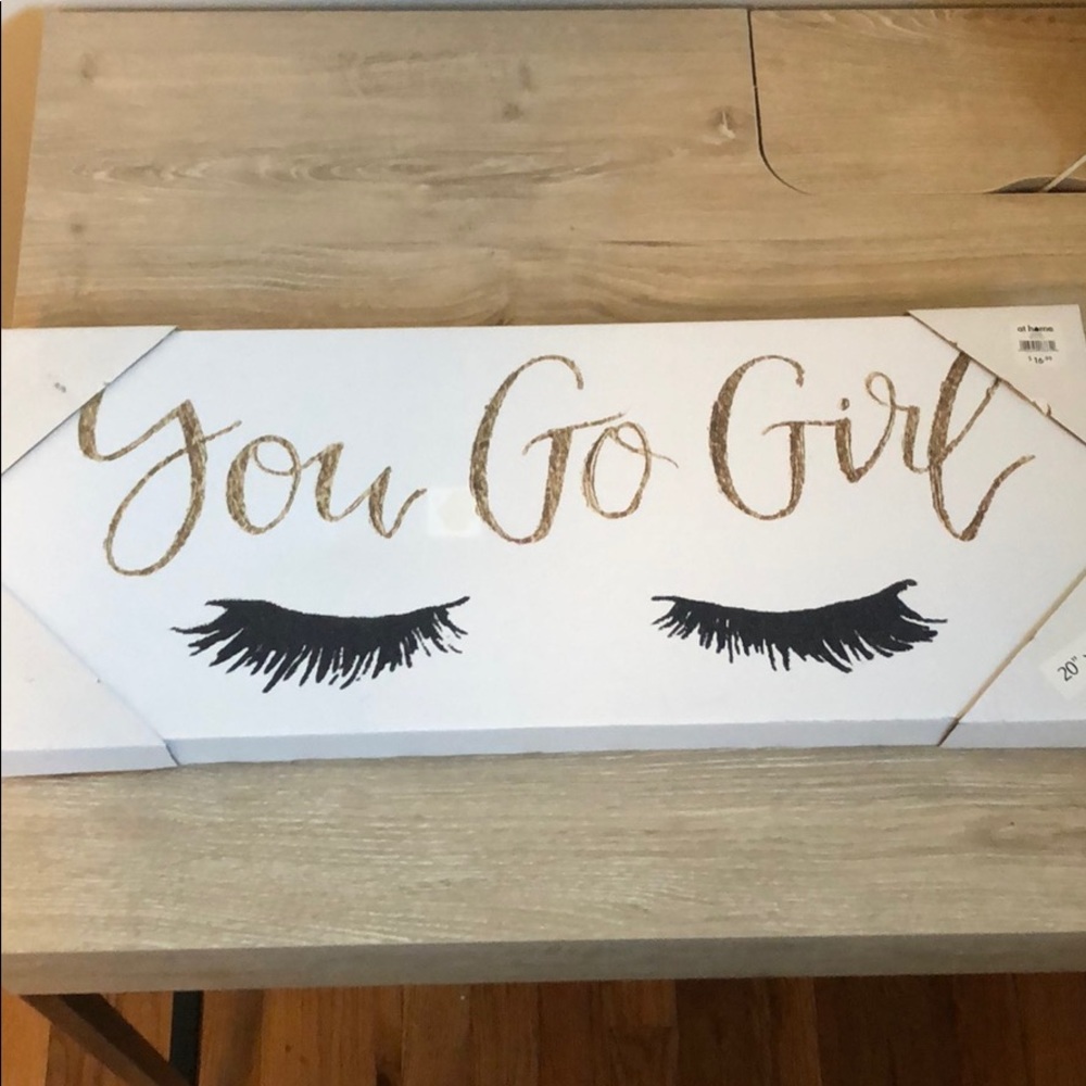 “You go girl” sign